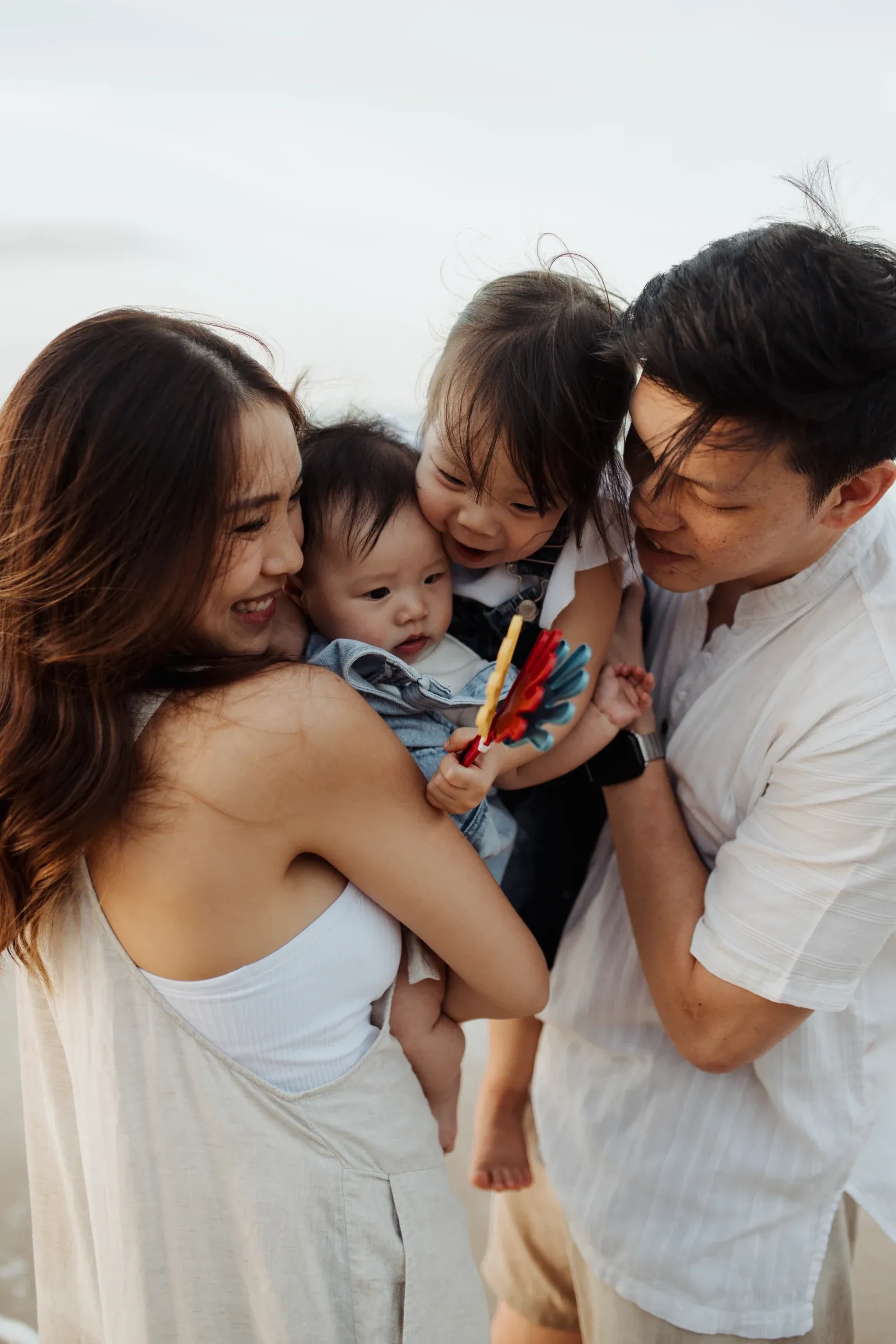 Family moments by the shore, outdoor family shoot by Ju Shiu Photography, Kuching, Sarawak